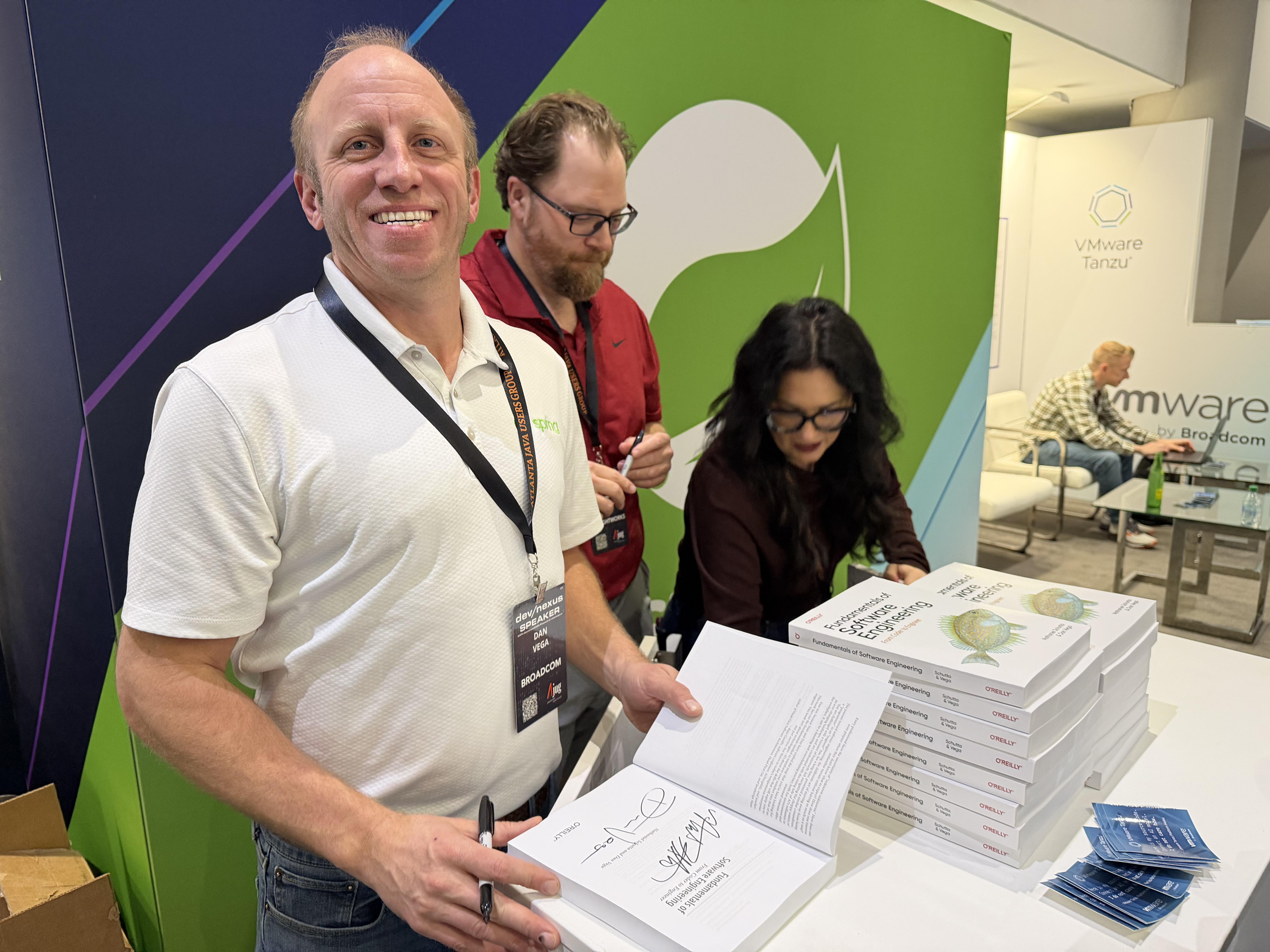 Book signing at the VMware Tanzu Booth